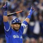Toronto Blue Jays' Edwin Encarnacion celebrates after hitting a walk-off three-run home run against the Baltimore Orioles during the 11th inning of an American League wild-card baseball game in Toronto, Tuesday, Oct. 4, 2016. (Frank Gunn/The Canadian Press via AP)