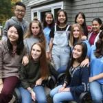Marshfield,MA 10/22/16 International students gather at a host home for orientation, all here attending public schools in southeastern Mass. the eleven students gather on the back porch for a group photo.... (George Rizer for the Globe) 
