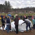 Bromfield students and other volunteers painted over the rock that was covered with hateful messages. 