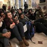 Boston, MA - 12/05/16 - Protesters wait unsuccessfully to see Governor Charlie Baker outside his office. Protesters, including some who walked out of local high school and college classes, brought concerns over the past election cycle to a rally on Boston Common, outside the State House, and then to the office of Governor Charlie Baker. (Lane Turner/Globe Staff) Reporter: () Topic: (06walkout)