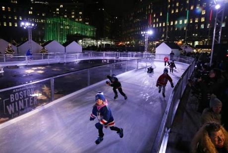 Young skaters take to the ice at the City Hall Plaza holiday site that opened on Wednesday, after a five-day delay due to mild weather.
