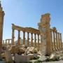 (FILES) This file photo taken on March 27, 2016 shows a view of the remains of Arch of Triumph, also called the Monumental Arch of Palmyra, that was destroyed by Islamic State (IS) group jihadists in October 2015 in the ancient Syrian city of Palmyra, after government troops recaptured the UNESCO world heritage site from the Islamic State (IS) group. Jihadist fighters of the Islamic State group on December 10, 2016 re-entered Syria's famed ancient desert city of Palmyra from which they were driven out eight months ago, a monitor said. / AFP PHOTO / Maher AL MOUNESMAHER AL MOUNES/AFP/Getty Images