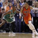 Thunder guard Russell Westbrook (0), who racked up 37 points, drove to the basket against Celtics guard Terry Rozier (12). 