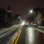 A light coating of snow lay on parts of Massachusetts Avenue late Sunday.