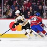 Bruins forward David Pastrnak sidestepped Canadiens defenseman Jeff Petry. 