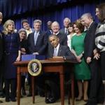 President Barack Obama signed the 21st Century Cures Act on Tuesday in Washington. 