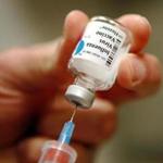 A nurse prepared an injection of the influenza vaccine at Massachusetts General Hospital in Boston.