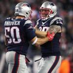 Foxborough, MA 12/12/16 The Patriots Chris Long (right) celebrates with teammate Rob Ninkovich (left) after a Ninkovich sack. New England Patriots play against the Baltimore Ravens at Gillette Stadium Monday, Dec. 12, 2016. (Jim Davis / Globe Staff)