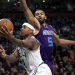 Celtics guard Isaiah Thomas drove past Hornets guard Nicolas Batum during the first quarter.