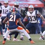 Denver CO 12/18/16 New England Patriots Dion Lewis putting a move on Denver Broncos Aquib Talib during second quarter action at Sports Authority Field at Mile High Stadium (Photo by Matthew J. Lee/Globe staff) topic: Patriots-Broncos reporter: 