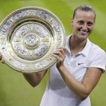 epa05683261 (FILE) A file picture dated 05 July 2014 shows Petra Kvitova of Czech Republic holdinf the championship trophy following her victory in the women's singles final of the Wimbledon Championships at the All England Lawn Tennis Club, in London, Britain. According to news reports on 20 December 2016 citing her management, Kvitova was injured in a knife attack at her home in Prostejov, Czech Republic. The management added she suffered an injury at the left hand in a suspected burglary. EPA/FACUNDO ARRIZABALAGA