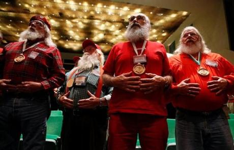Santas learn breathing techniques as they attend class at the Charles W. Howard Santa Claus School in Midland, Michigan, U.S. October 27, 2016. REUTERS/Christinne Muschi SEARCH 