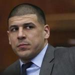 Aaron Hernandez appears during a hearing at Suffolk Superior Court, Tuesday, Dec, 20, 2016, in Boston. Former New England Patriots star Aaron Hernandez has lost his bid to delay his trial in the 2012 killing of two men in Boston. Prosecutors say a Suffolk Superior Court judge on Tuesday denied a request by Hernandez's lawyer to delay the trial slated to start Feb. 13. (Angela Rowlings/The Boston Herald via AP, Pool)

