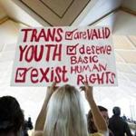 Hunter Schafer held up a sign in favor of repealing North Carolina?s HB2 in Raleigh, N.C., on Wednesday.