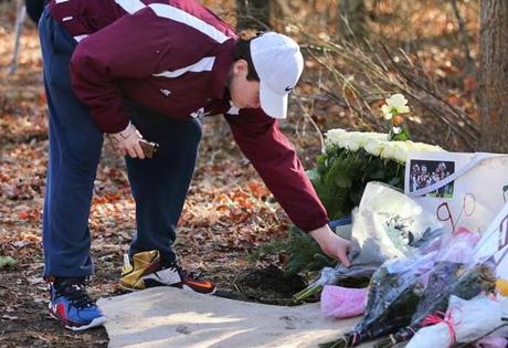 Friends and classmates mourned at the site of the fatal car crash in Falmouth on Friday. 
