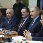 Israeli Prime Minister Benjamin Netanyahu, second right, attends a weekly cabinet meeting in Jerusalem, Sunday, Dec. 25, 2016. (Dan Balilty/Pool photo via AP)