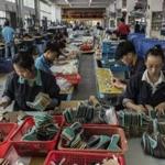 Workers on the assembly line at the Huajian shoe factory in Dongguan, China, earlier this month. The factory produces heels for Ivanka Trump?s line of shoes.