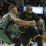 Cleveland Cavaliers' LeBron James (23) drives against Boston Celtics' Marcus Smart (36) in the second half of an NBA basketball game, Thursday, Dec. 29, 2016, in Cleveland. (AP Photo/Tony Dejak)