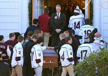 Mourners gathered outside St. Anthony?s Church in Falmouth for the funeral of Falmouth High student Owen Higgins. 
