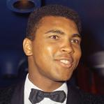 U.S. boxing great Muhammad Ali poses during the Crystal Award ceremony at the World Economic Forum (WEF) in Davos, Switzerland in this January 28, 2006 file photo. Ali, one of the best-known U.S. Muslims, appeared December 9, 2015 to join the chorus condemning the proposal by Republican presidential front-runner Donald Trump to temporarily stop Muslims from entering the country. REUTERS/Andreas Meier/Files