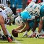 MIAMI GARDENS, FL - JANUARy 03: Miami Dolphins and New England Patriots players line up before a snap during the first quarter of the game at Sun Life Stadium on January 3, 2016 in Miami Gardens, Florida. (Photo by Mike Ehrmann/Getty Images)