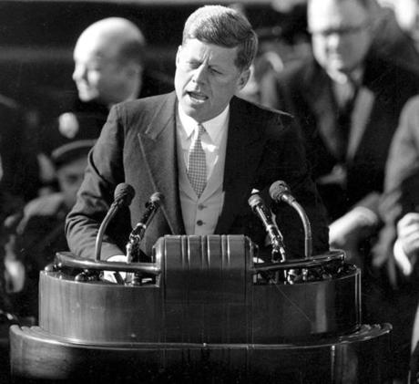 FILE - This Jan. 20, 1961 black and white file photo shows U.S. President John F. Kennedy delivering his inaugural address after taking the oath of office at Capitol Hill in Washington. (AP Photo/File)
