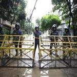 epa05700658 (FILE) - A file photo dated 03 July 2016 shows security officials standing guard behind a barbed wire barricade at a checkpoint in the streets close to the Holey Artisan Bakery, site of a terrorists attack, in Dhaka, Bangladesh. According to reports on 06 January 2017, Bangladesh police said they have killed a suspect believed to be the man behind the cafe attack in Dhaka last July, in which 20 hostages were killed. The man, Nurul Islam Marzan, was killed along with an unidentified man in a shootout with the police in Dhaka, in the early hours of 06 January 2017. EPA/STRINGER