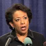 Attorney General Loretta Lynch spoke during a news conference Friday in Chicago. 