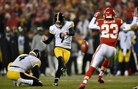 KANSAS CITY, MP - JANUARY 15: Kicker Chris Boswell #9 of the Pittsburgh Steelers scores the first points of the game against the Kansas City Chiefs kicking a field goal from the hold of teammate punter Jordan Berry #4 in the first quater of the AFC Divisional Playoff game at Arrowhead Stadium on January 15, 2017 in Kansas City, Missouri. (Photo by Peter Aiken/Getty Images)
