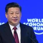 China's President Xi Jinping delivers a speech on the opening day of the World Economic Forum, on January 17, 2017 in Davos. The global elite begin a week of earnest debate and Alpine partying in the Swiss ski resort of Davos on Tuesday, in a week bookended by two presidential speeches of historic import. / AFP PHOTO / FABRICE COFFRINIFABRICE COFFRINI/AFP/Getty Images