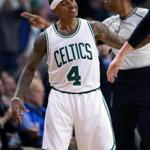 Boston, MA 1-11-17: Isaiah Thomas lead the Celtics to a 117-108 victory over the Wizards, and after he hit a fourth quarter three pointer that put Boston ahead 95-91 he was all smiles. The basket forced the Wizards to call a timeout, which the referee in the backround is signaling. The Boston Celtics hosted the Washington Wizards in a regular season NBA basketball game at the TD Garden. (Globe Staff Photo/Jim Davis) reporter: himmelsbach topic: Celtics-Wizardsl