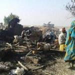 This handout image received courtesy of Doctors Without Border (MSF) on January 17, 2017, shows people standing next to destruction after an air force jet accidentally bombarded a camp for those displaced by Boko Haram Islamists, in Rann, northeast Nigeria. At least 52 aid workers and civilians were killed on January 17, 2017, when an air force jet accidentally bombed a camp in northeast Nigeria instead of Boko Haram militants, medical charity MSF said. / AFP PHOTO / MÃ©decins sans FrontiÃ¨res (MSF) / Handout / RESTRICTED TO EDITORIAL USE - MANDATORY CREDIT 