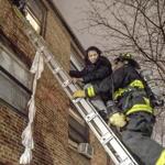 A firefighter rescued a resident from the apartment in Charlestown. 