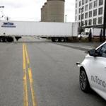 South Boston, MA -- 1/4/2017 - NuTonomy's driverless car pauses as a truck pulls out as it takes a spin around Drydock Ave. (Jessica Rinaldi/Globe Staff) Topic: 05driverlesscar Reporter: 