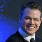 US actor Matt Damon smiles as he takes part in a meeting on the opening day of the World Economic Forum, on January 17, 2017 in Davos. The global elite begin a week of earnest debate and Alpine partying in the Swiss ski resort of Davos in a week bookended by two presidential speeches of historic import. / AFP PHOTO / FABRICE COFFRINIFABRICE COFFRINI/AFP/Getty Images