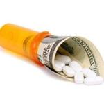 bottle of pills and money isolater on white; Shutterstock ID 113795932; PO: oped