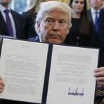 President Trump showed off his signature Tuesday on an executive order to advance construction of the Dakota Access pipeline.
