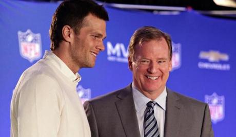 FILE - In this Feb. 2, 2015, file photo, New England Patriots quarterback Tom Brady, left, poses with NFL Commissioner Rodger Goodell during a news conference where Brady was presented the Super Bowl MVP in Phoenix, Ariz. Brady's four-game suspension for his role in using underinflated footballs during the AFC championship game last season has been upheld by Commissioner Goodell. The league announced the decision Tuesday, July 28, 2015. (John Samora/The Arizona Republic via AP, File) MARICOPA COUNTY OUT; MAGS OUT; NO SALES
