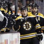 Boston Bruins' Brad Marchand (63) celebrates his goal during the first period of an NHL hockey game against the Philadelphia Flyers in Boston, Saturday, Jan. 14, 2017. (AP Photo/Michael Dwyer)