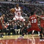Chicago Bulls guard Rajon Rondo (9) looks to pass the ball around Miami Heat forward Udonis Haslem (40) during the second half of an NBA basketball game in Chicago, Friday, Jan. 27, 2017. The Heat won 100-88. (AP Photo/David Banks)