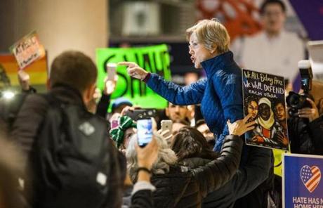 Elizabeth Warren spoke to protesters at Logan.
