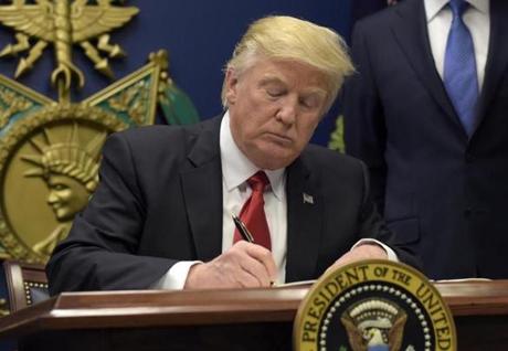 President Donald Trump signed an executive order severely limiting immigration from seven Muslim-majority nations on Friday.
