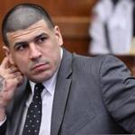 Former New England Patriots player Aaron Hernandez appears in Suffolk Superior Court during a pretrial hearing before Judge Jeffrey Locke, on Tuesday, December 27, 2016 in Boston. Hernandez, who is serving a life sentence for a 2013 murder, is scheduled to go on trial in Feb 13, 2017 for the murder of two men in a 2012 drive-by shooting. Josh Reynolds for The Boston Globe/Pool (Metro, Pool ) 