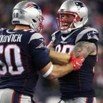 Rob Ninkovich and Chris Long keep each other smiling. 