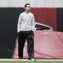 Atlanta Falcons offensive coordinator Kyle Shanahan, left, walks through a workout at the football team's practice facility in Flowery Branch, Ga., Thursday, Jan. 26, 2017. Shanahan is trying to keep the next 10 days as normal as possible. Good luck with that. Shanahan is preparing for his first Super Bowl, a game his father won twice, and is expected to become coach of the San Francisco 49ers as soon as the season is over. (AP Photo/David Goldman)