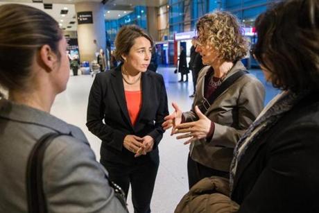 01/28/2017 BOSTON, MA AG Maura Healey (cq) (left) speaks with immigration attorney Susan Church (cq) at Boston Logan Airport's Terminal E for international arrivals. (Aram Boghosian for The Boston Globe)
