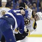 Boston Bruins right wing Jimmy Hayes (11) and Tampa Bay Lightning left wing Alex Killorn (17) fight during the first period of an NHL hockey game Tuesday, Jan. 31, 2017, in Tampa, Fla. Both players received five-minute major penalties. (AP Photo/Chris O'Meara)