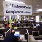 FILE - This Thursday, Sept. 29, 2016, file photo, shows the Illinois Department of Employment Security office in Springfield, Ill. On Thursday, Oct. 20, 2016, the Labor Department reports on the number of people who applied for unemployment benefits the week before. (AP Photo/Seth Perlman, File)