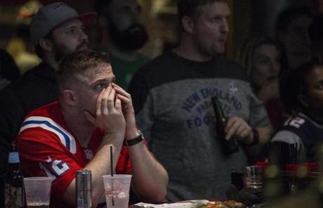 Boston, MA - 2/5/2017 - Fans react as they watch the second half of SuperBowl 51 between the New England Patriots and the Atlanta Falcons at the bar Game On in Boston, MA, February 5, 2017. (Keith Bedford/Globe Staff)
