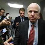 Senator John McCain was trailed by reporters while walking to the Senate Chamber Jan. 31.